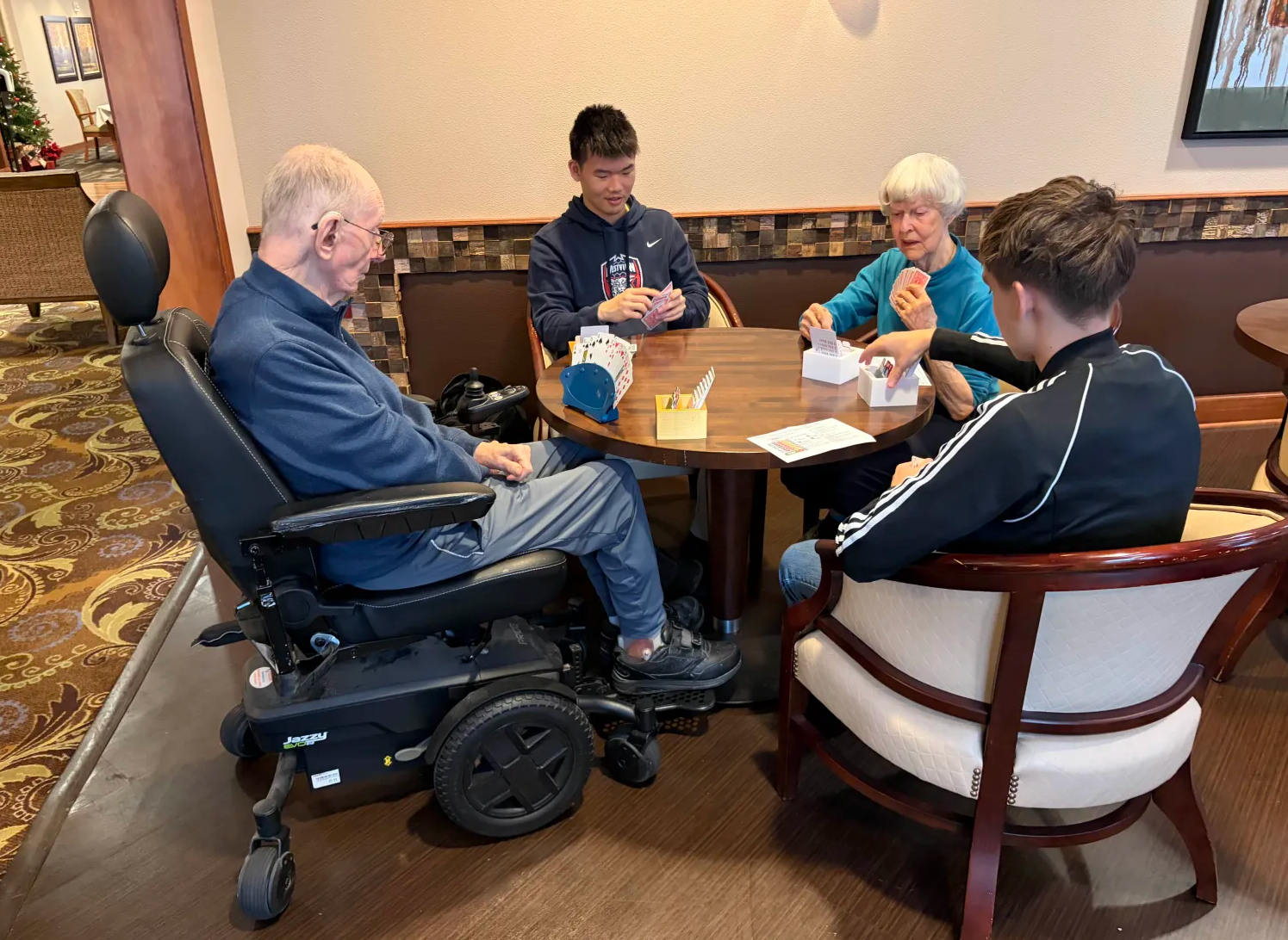 Arthur Smiling at his hand of less than 3 points and Dmitry getting ready to pass